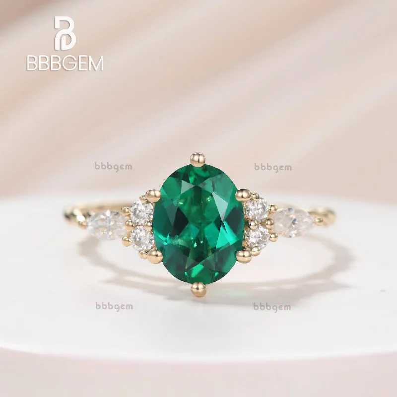 cushion cut engagement rings -6x8 Oval Cut Lab Emerald & Diamond Ring With Yellow Gold Twisted Mini Rope Band