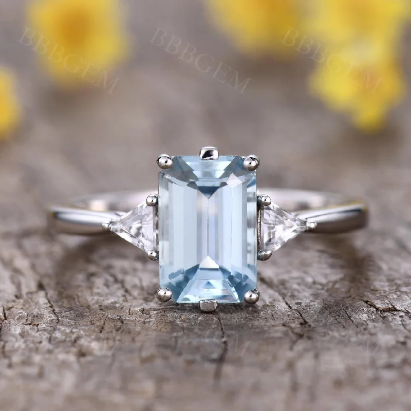 custom designed engagement rings -Three Stone Aquamarine Engagement Ring With White Topaz Triangle Accents 18k Gold